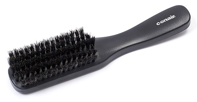 Bien choisir votre brosse cheveux bouclés